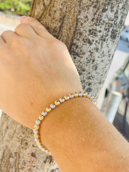 bracciale in oro bianco e giallo